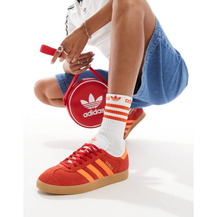 adidas Originals Gazelle trainers in red and orange with gum sole ASOS