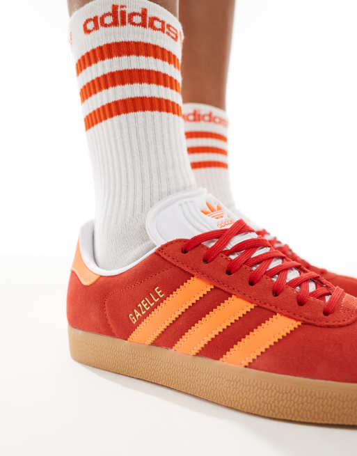 adidas Originals Gazelle trainers in red and orange with gum sole ASOS