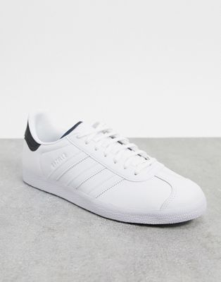 white adidas gazelle trainers