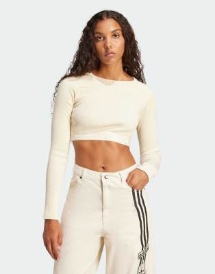 adidas Originals - Geripptes langärmliges Cropped-Oberteil in Creme-Weiß