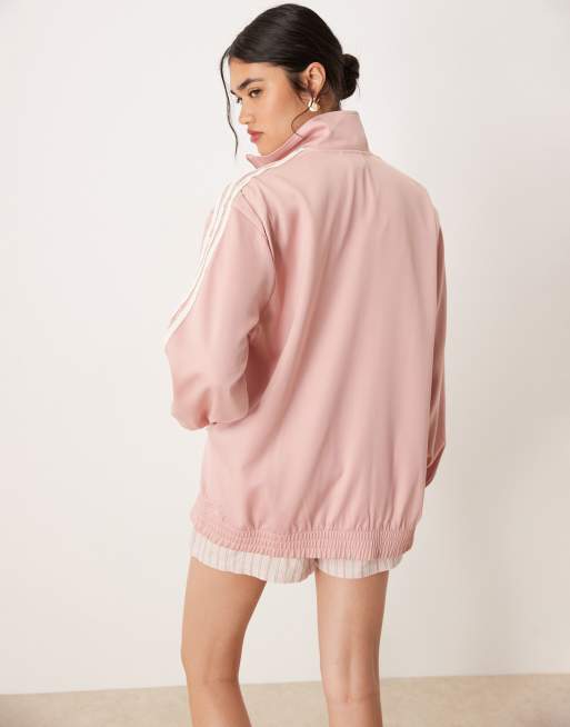 adidas Originals satin track top in pink with ruffle 3 stripe