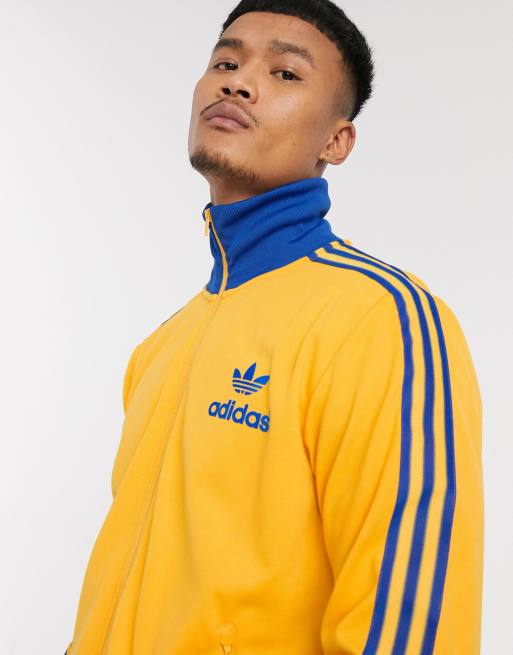 Giacca adidas outlet oro