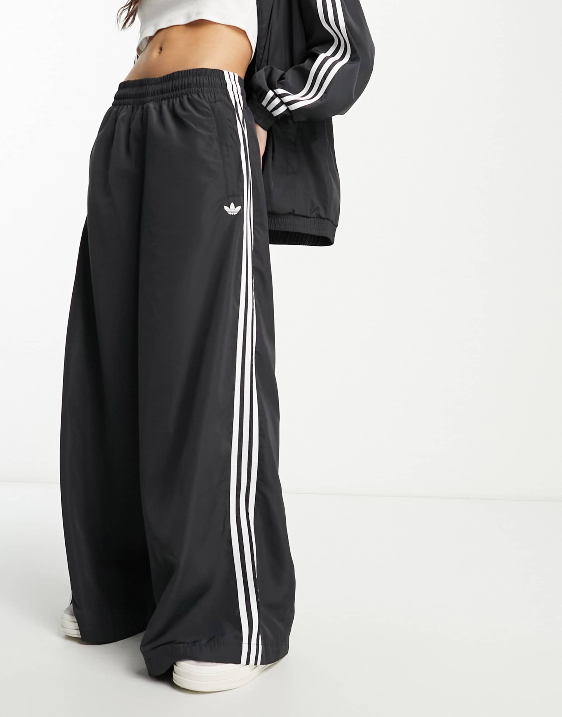 adidas Originals 'GOTHCORE' oversized 3 stripe parachute trousers in black view 3