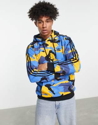 Beknopt Ramen wassen Verwarren adidas Originals Graphics all-over camo print hoodie in collegiate gold |  ASOS