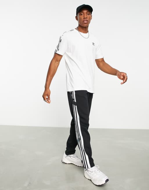 Adidas camo stripe pants hot sale