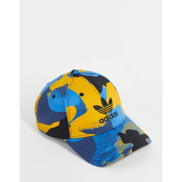 adidas Originals graphics logo baseball cap in blue camo