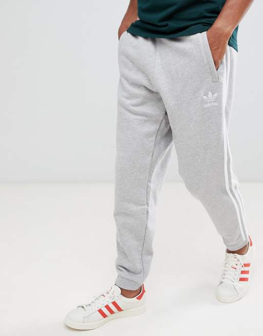 adidas Originals - Graue Jogginghose mit3 Streifen, DH5802 adidas Originals - Graue Jogginghose mit3 Streifen, DH5802