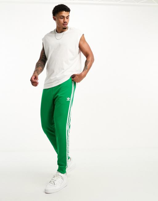 adidas Originals – Gröna och vita mjukisbyxor