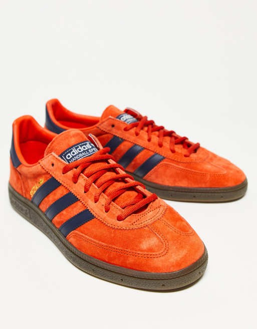 adidas Originals gum sole Handball Spezial trainers in orange and blue