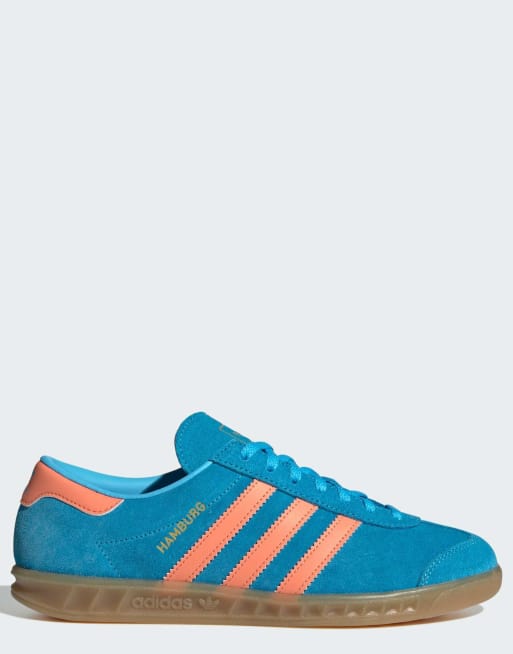 adidas Originals - Hamburg - Blå sneakers med orange detaljer 