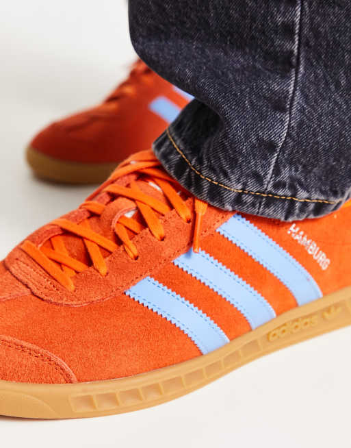 adidas Originals Hamburg trainers in orange with gum sole