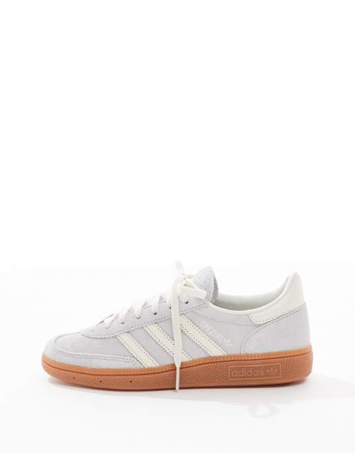 adidas Originals Handball Spezial gum sole trainers in silver and white