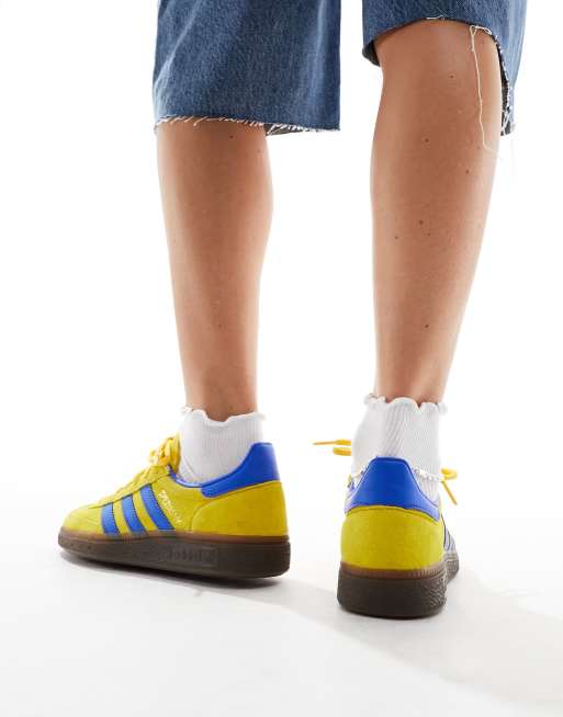 Blue and yellow adidas best sale samba trainers