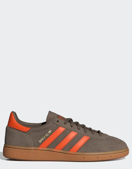 adidas Originals Handball Spezial shoes in cargo brown / orange / gold metallic