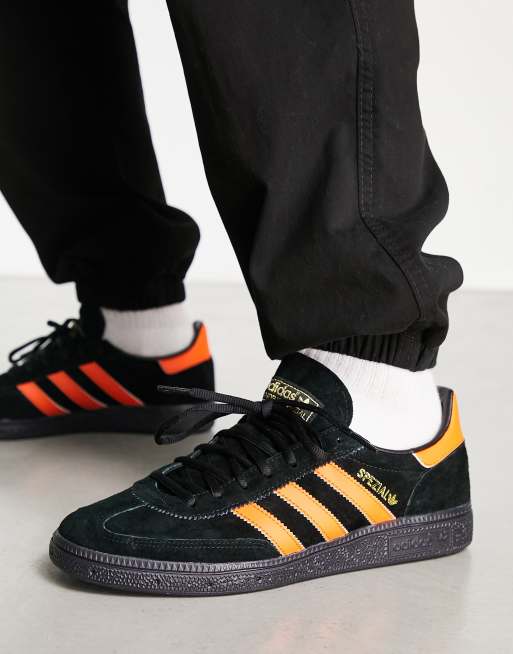 Adidas spezial on sale black orange