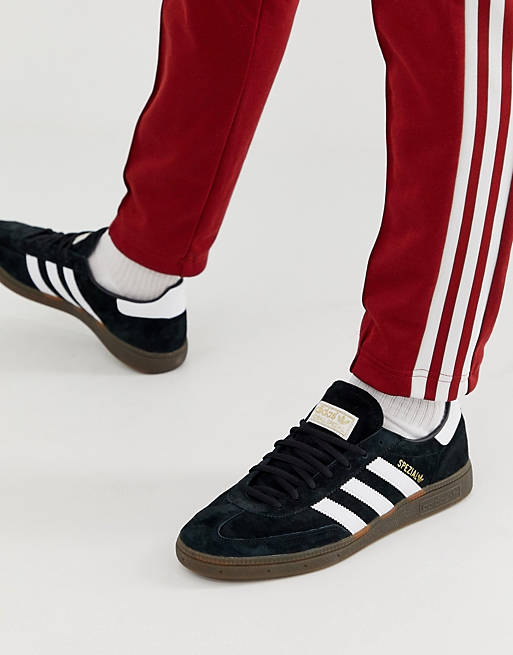 on the other hand, never Christian adidas Originals handball spezial sneakers in black with gum sole | ASOS