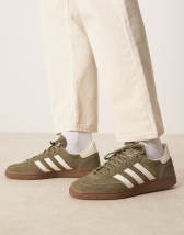 New Balance 9060 sneakers in white with gray metallic detail