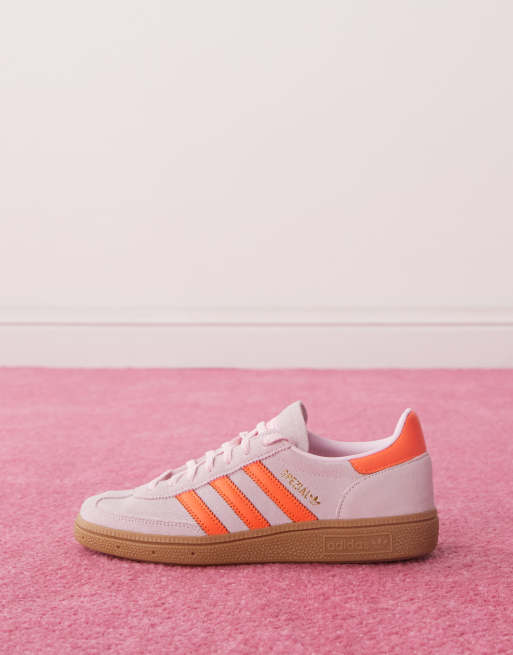 adidas Originals Handball Spezial sneakers in pink and orange