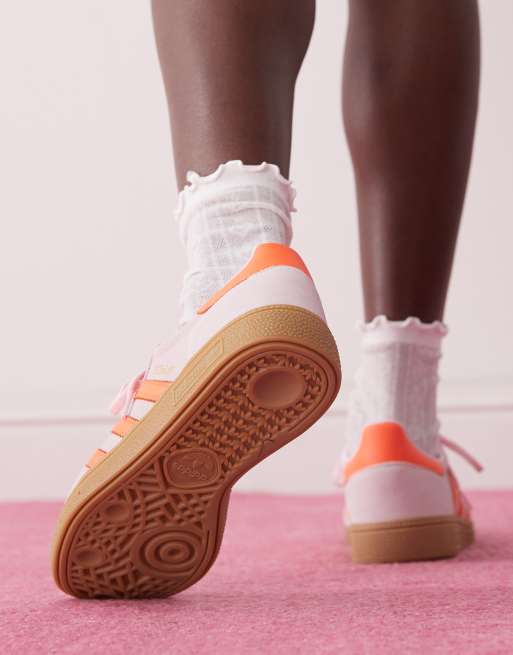 adidas Originals Handball Spezial sneakers in pink and orange