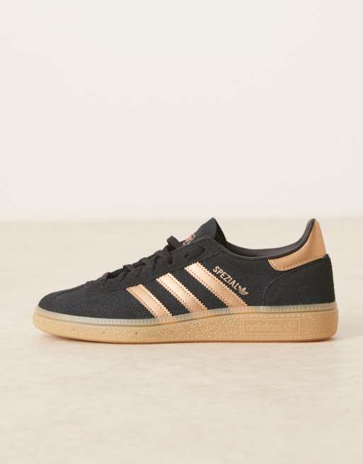 adidas Originals Handball Spezial trainers in black and bronze | ASOS