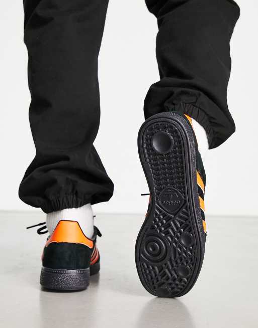 Adidas spezial black on sale and orange