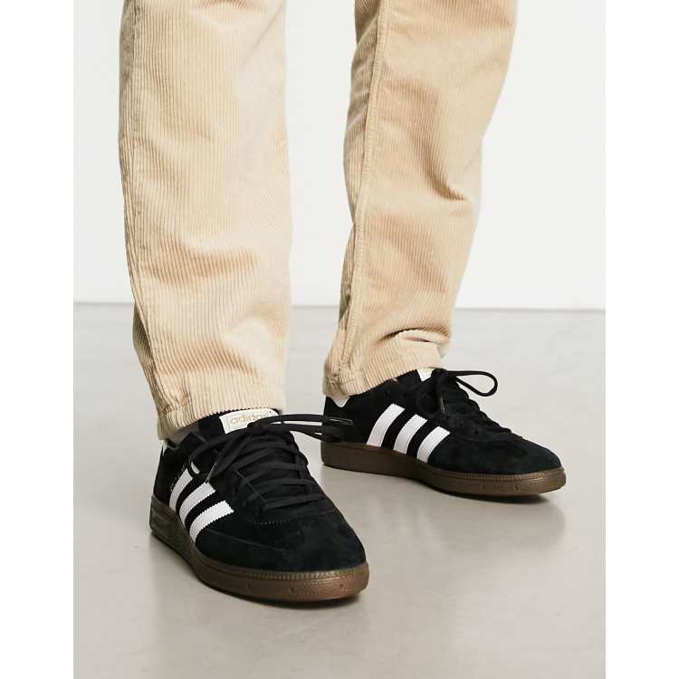 adidas Originals Handball Spezial trainers in black with gum sole