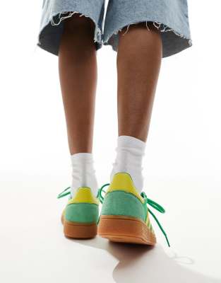 adidas Originals Handball Spezial trainers in green and yellow