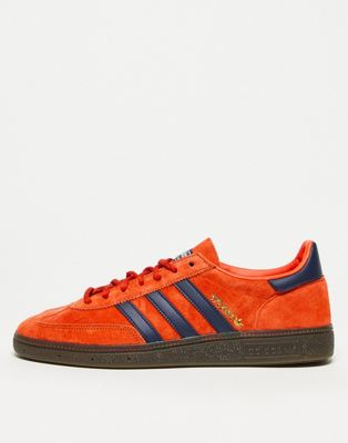 adidas Originals gum sole Handball Spezial trainers in orange and blue
