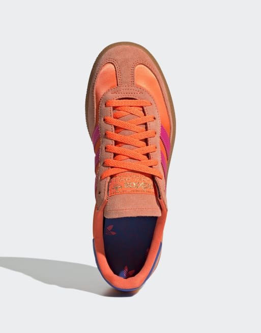adidas Originals Handball spezial trainers in solar orange and pink