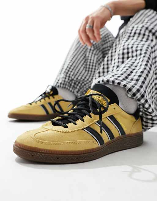 adidas Originals Handball Spezial trainers in yellow and black