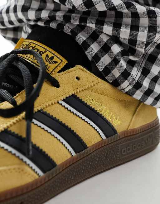 adidas Originals Handball Spezial trainers in yellow and black