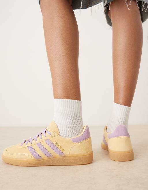 adidas Originals Handball Spezial trainers in yellow and lilac