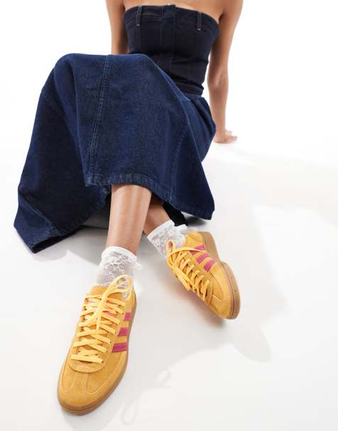 adidas Originals Handball Spezial trainers in yellow and pink with gum sole - view 1