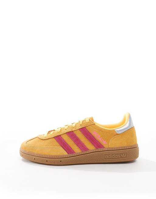 adidas Originals Handball Spezial sneakers in yellow and pink with gum sole
