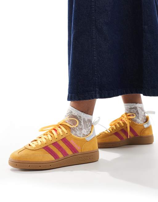 adidas Originals Handball Spezial sneakers in yellow and pink with gum sole