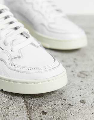 Adidas originals supercourt trainers in shop white x home of classics edition