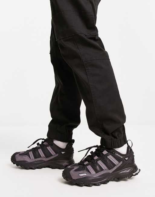 adidas Originals Hyperturf trainers in black