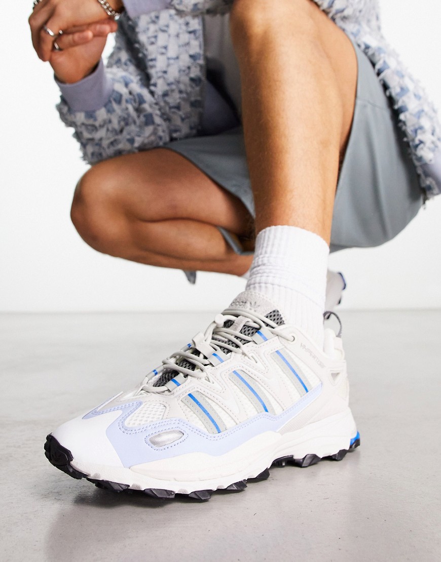 adidas Originals Hyperturf trainers in white and blue