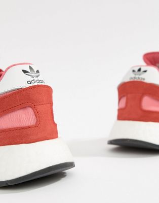 pink and red adidas trainers