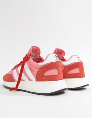red and pink adidas trainers