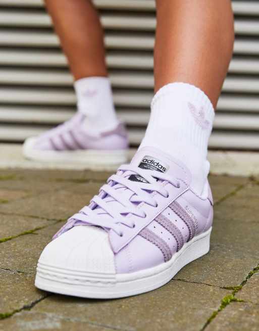 adidas Originals International Womens Day Superstar sneakers in white and  lilac