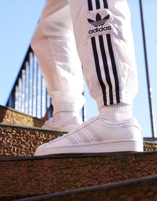 adidas Originals International Womens Day Superstar sneakers in white and  lilac