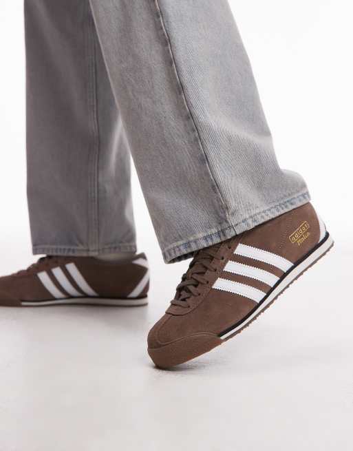 adidas Originals – Italia – Bruna och vita sneakers