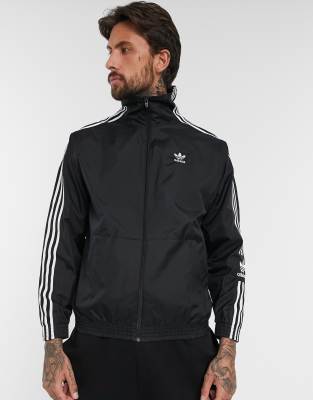 adidas originals locked up logo track jacket in black