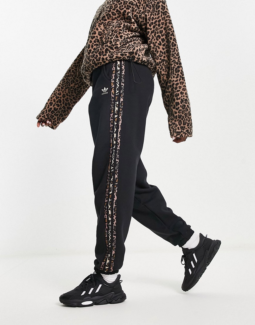 adidas Originals jogger with leopard print three stripe in black