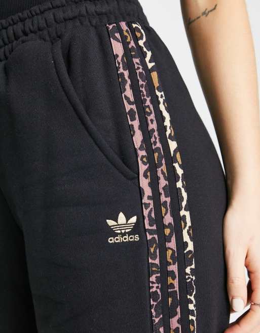 adidas Originals jogger with leopard print three stripe in black