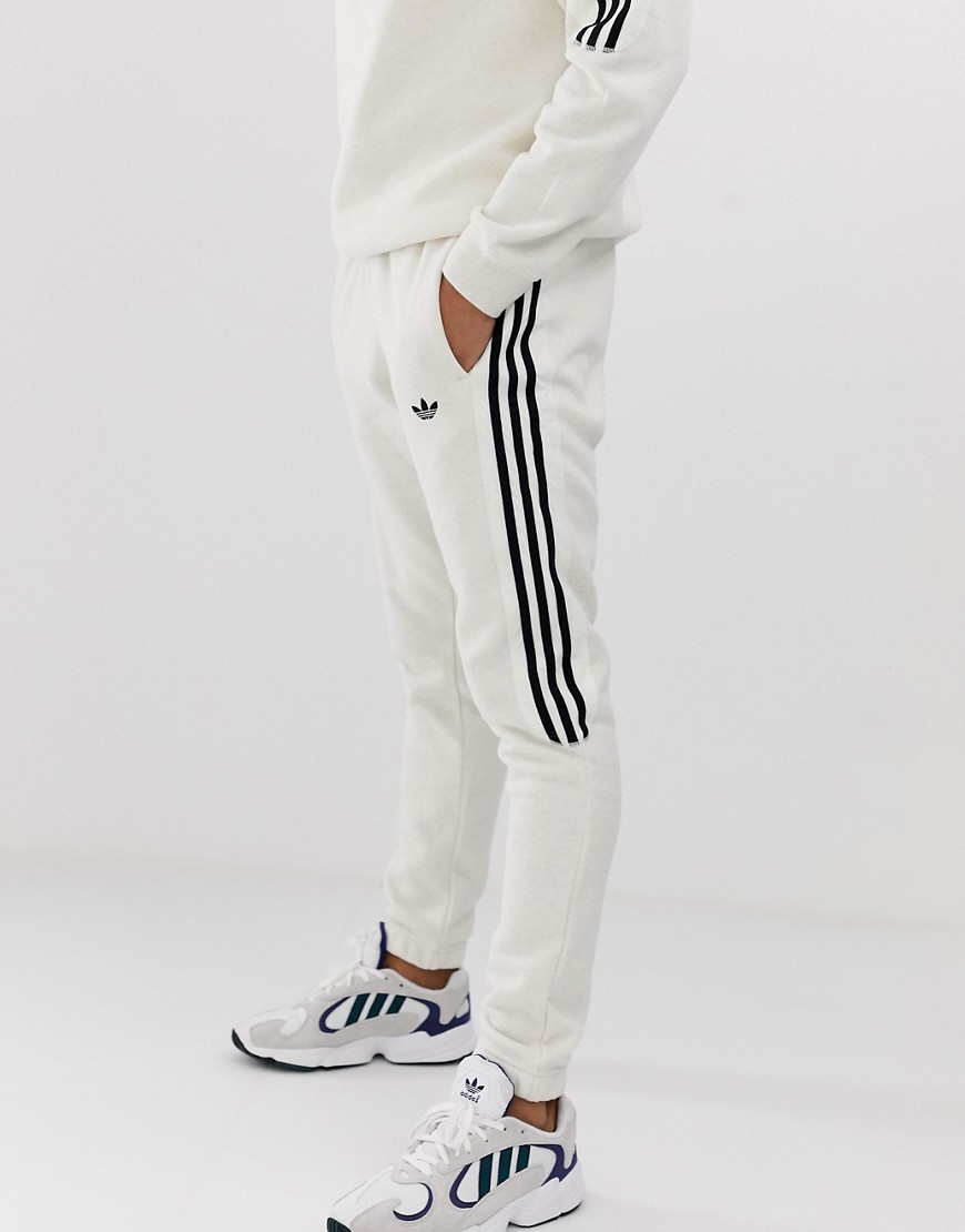adidas Originals joggers 3 stripes in off white-Red