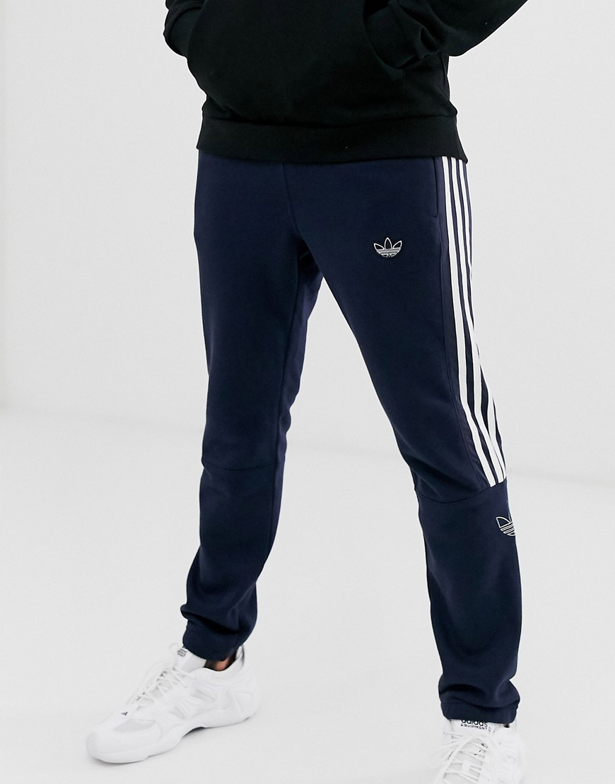 Adidas Originals - Joggers blu navy con profilo di trifoglio