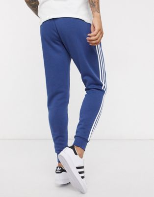 adidas originals joggers in blue with 3 stripe branding