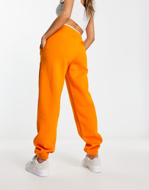 adidas Originals joggers in bright orange